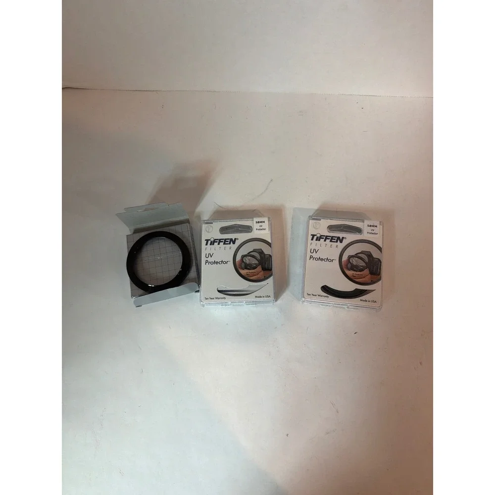 Lot of 2 Tiffen 58mmUV Protector Camera Lens Filters and 58mm step ring